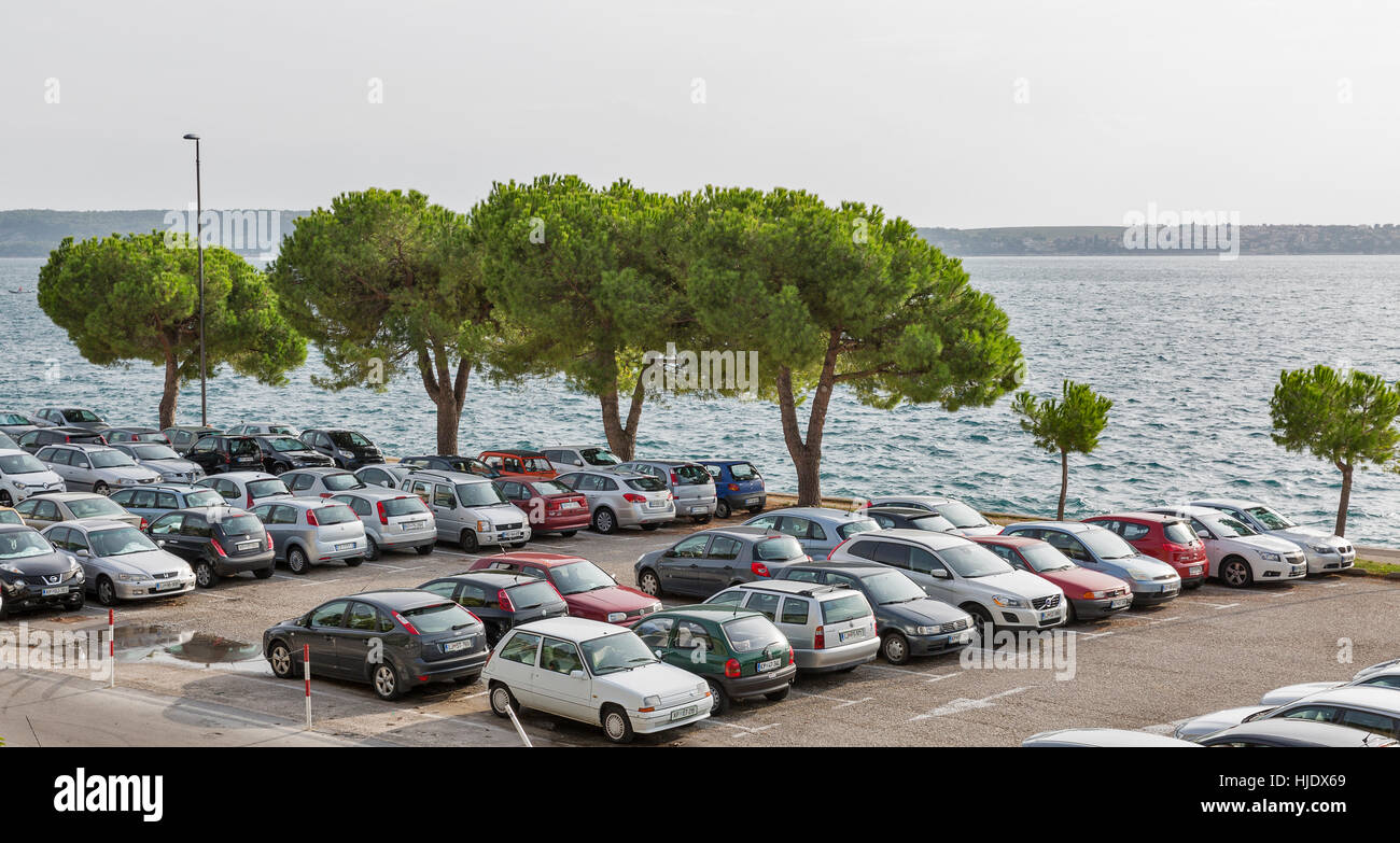 PIRAN, SLOVENIA SEPTEMBER 16, 2015 Car parking lot with cars on the seafront. Piran is a town