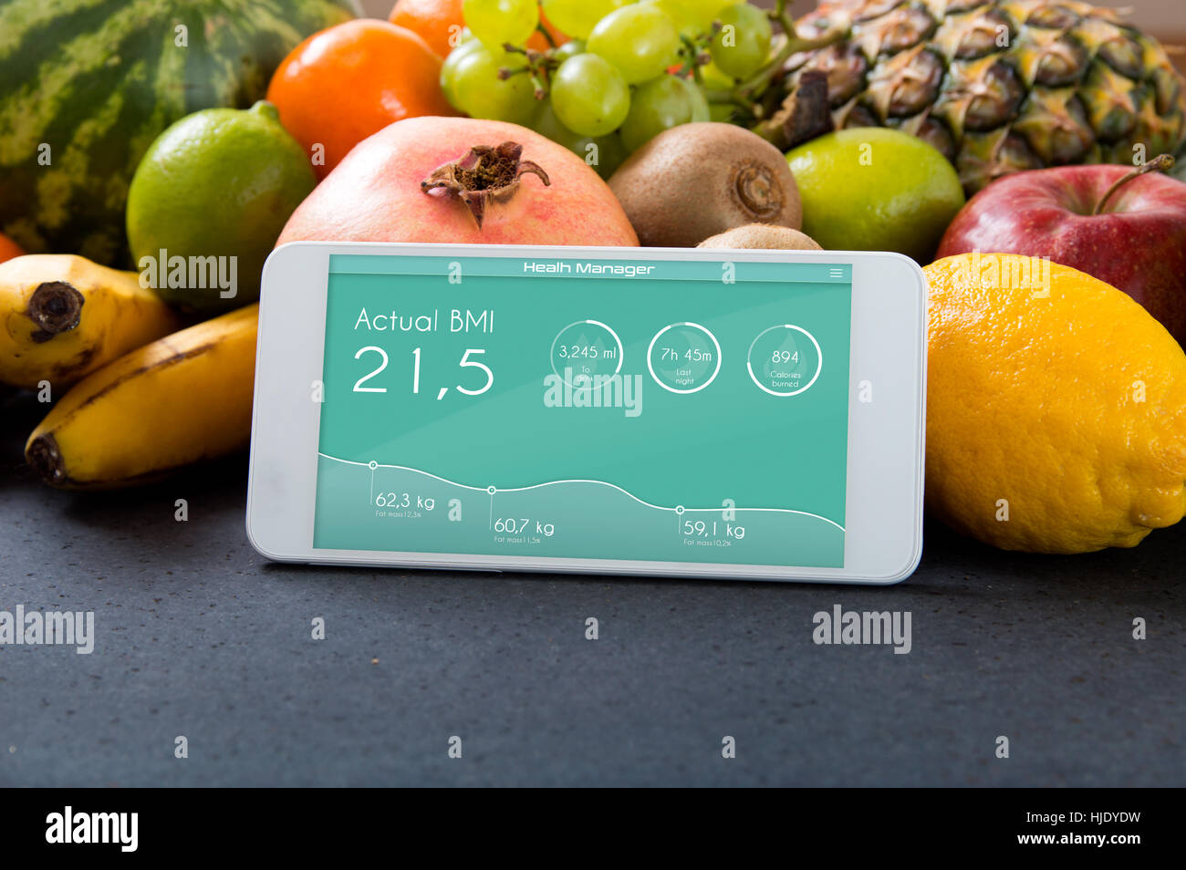 Smartphone with app showing BMI. Concept of app for healthcare Stock Photo