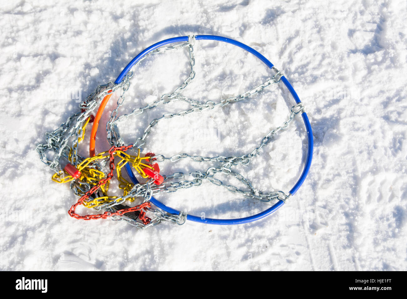 Snow chains on the road ready to be mounted Stock Photo Alamy