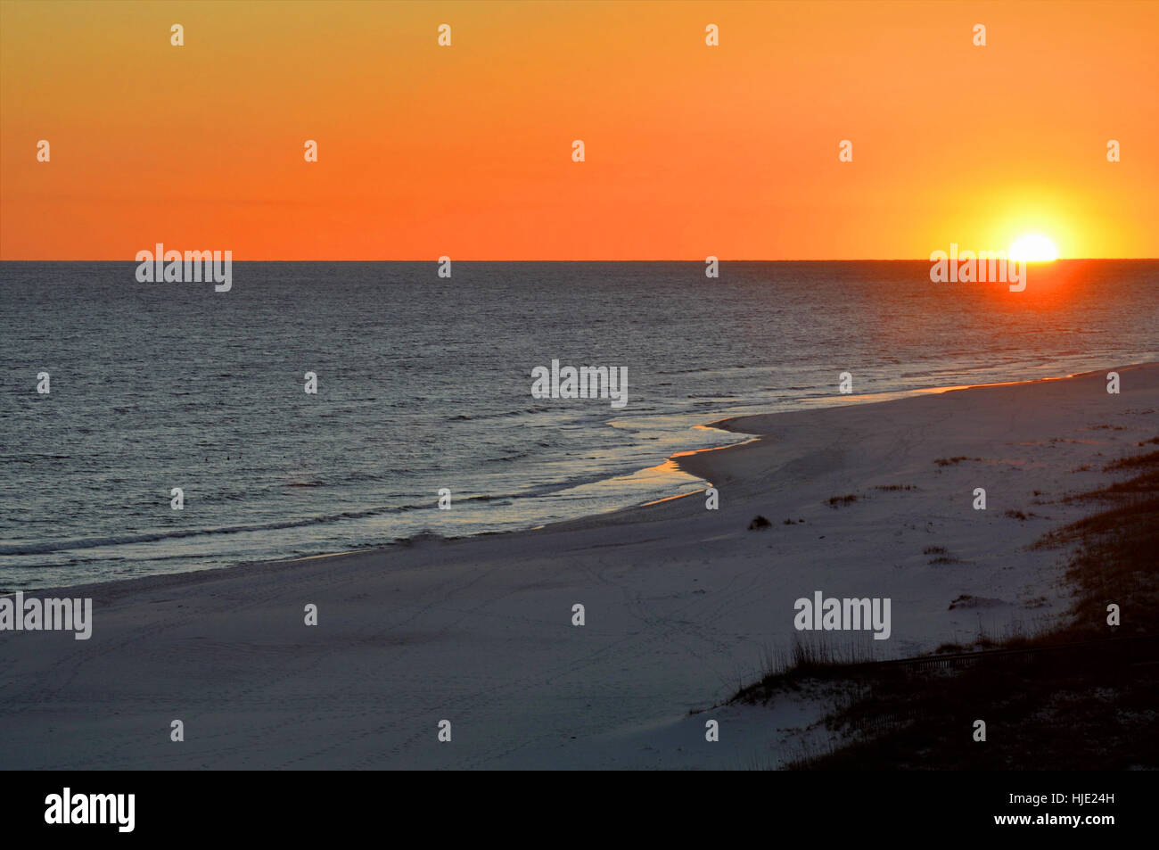 Golden sun rising over calm hi-res stock photography and images - Alamy