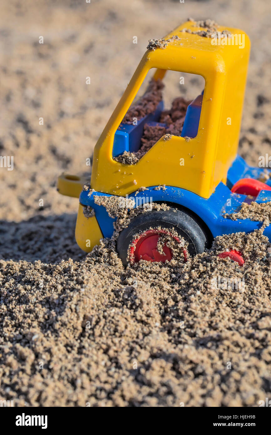 toy car in sandbox Stock Photo Alamy