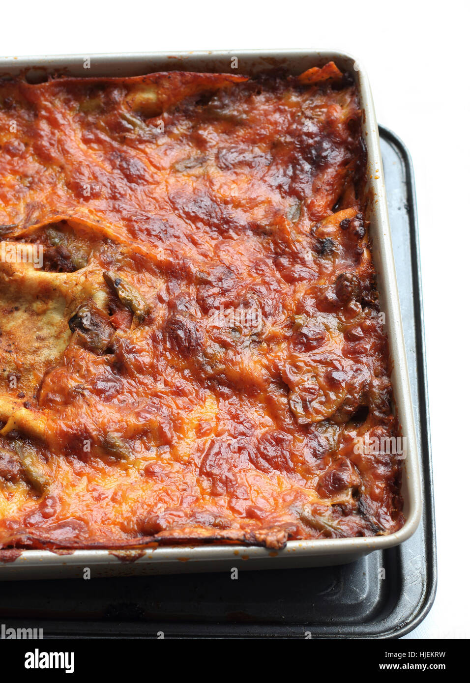 Freshly Baked Homemade Lasagna isolated against white background Stock Photo