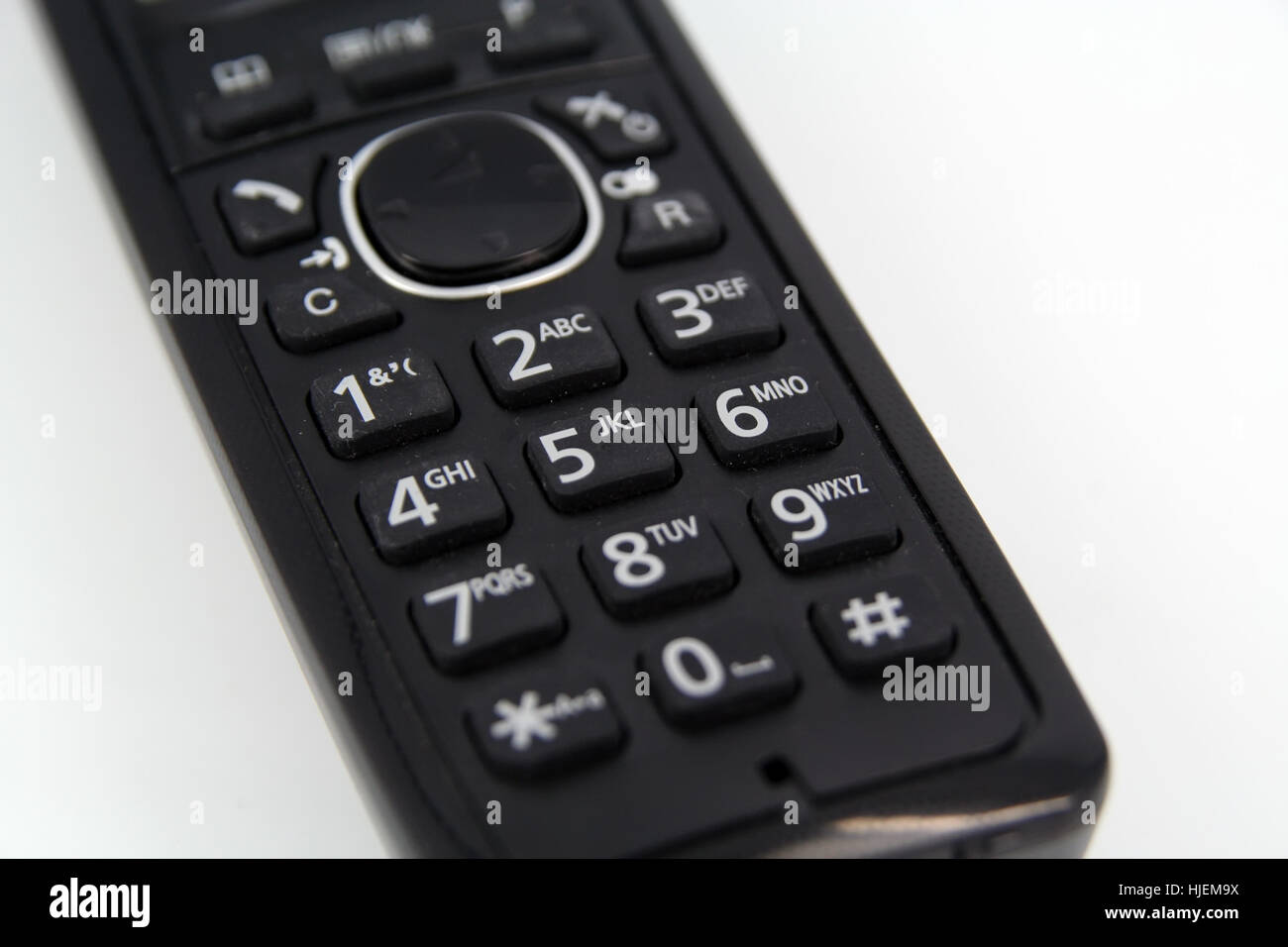 Black Phone dial. Phone handset dial numbers. Black plastic phone set dial numbers Stock Photo