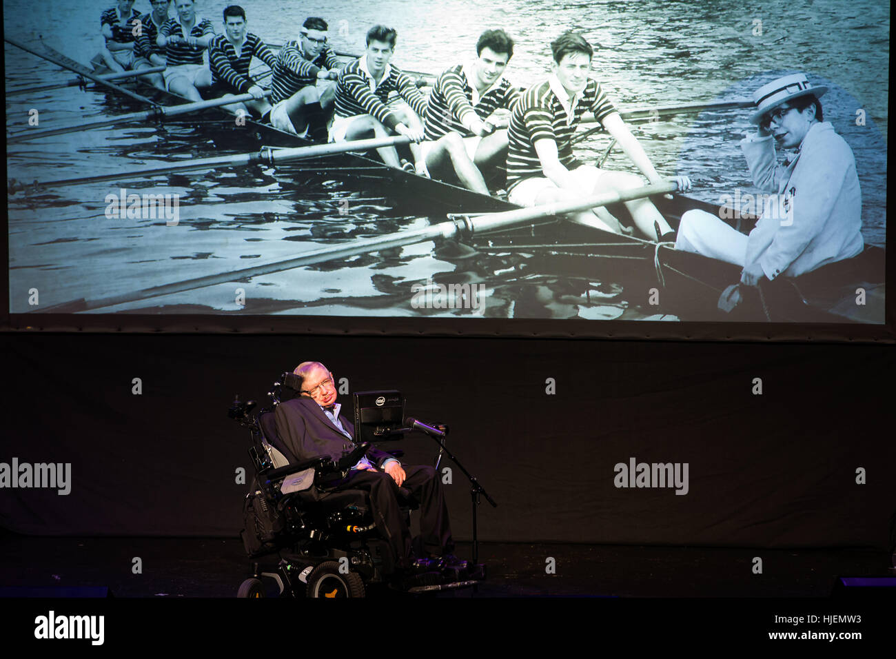 Stephen Hawking, British scientist, world renowned physicistportrait with college pictures from his young age in the background, Starmus festival Stock Photo