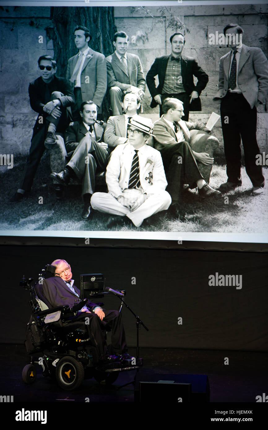 Stephen Hawking, British scientist, world renowned physicist portrait with college pictures from his young age in the background, Starmus festival Stock Photo