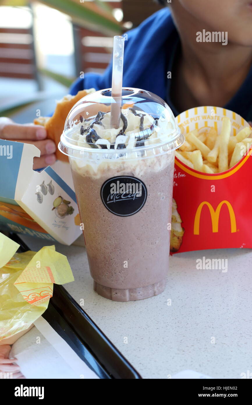 Close up of McDonald's chocolate Frappe and potato chips in McDonald's Melbourne Victoria Australia Stock Photo