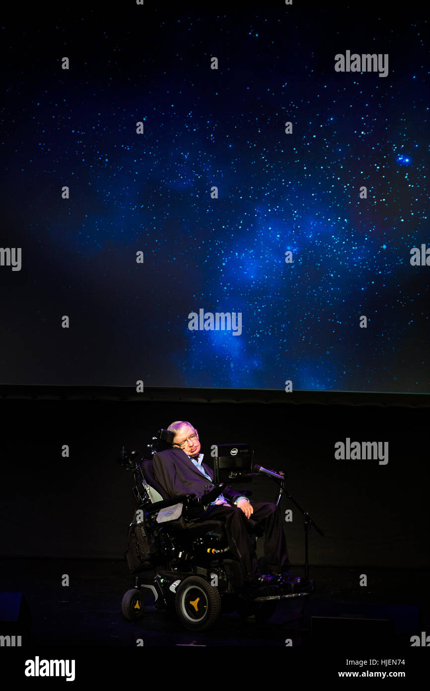 Prof. Stephen Hawking, British scientist, world renowned physicist, symbolic portrait, with universe projection on screen, Starmus festival Tenerife Stock Photo