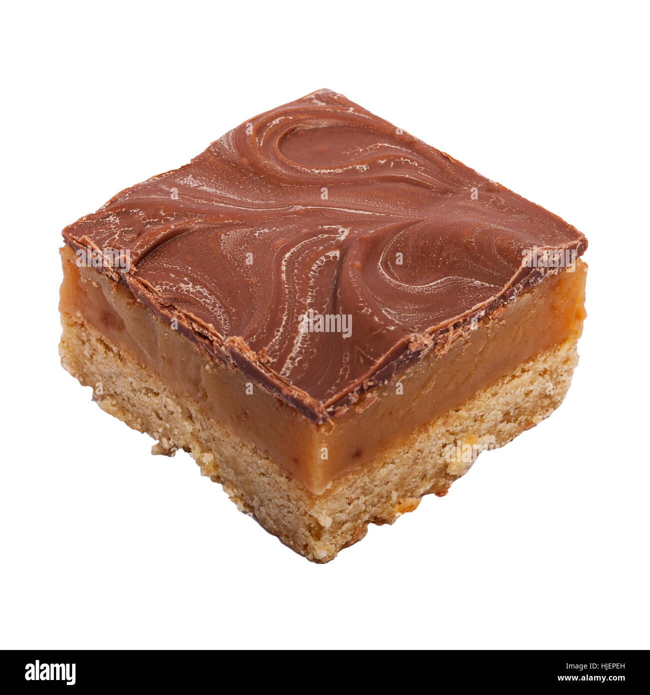 A home made caramel millionaire shortbread on a white background Stock Photo