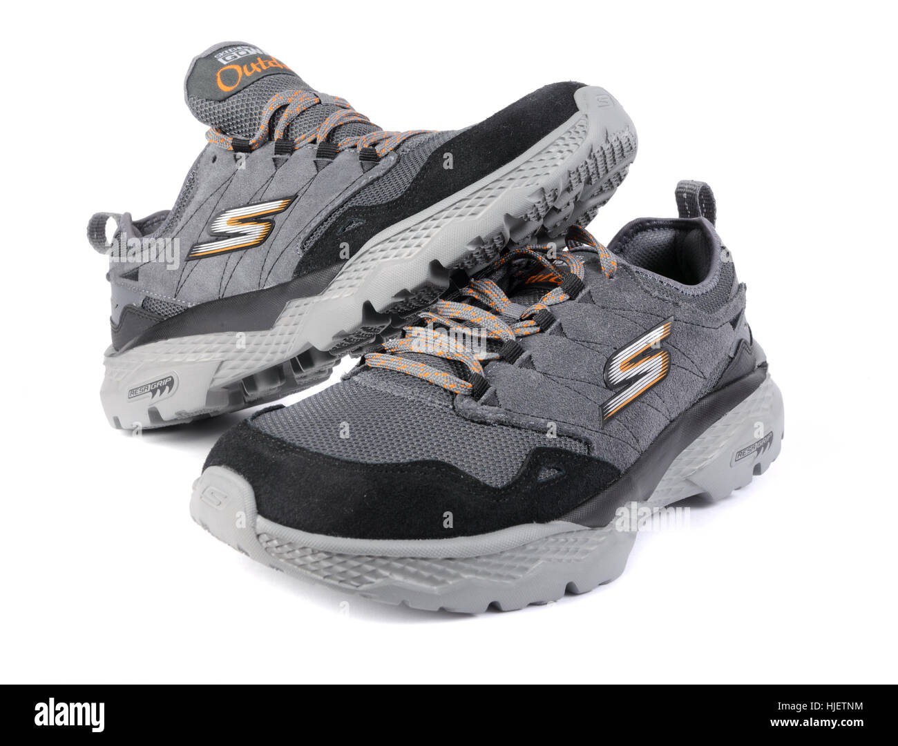 One pair of grey Skechers hiking shoes isolated on white background Stock  Photo - Alamy