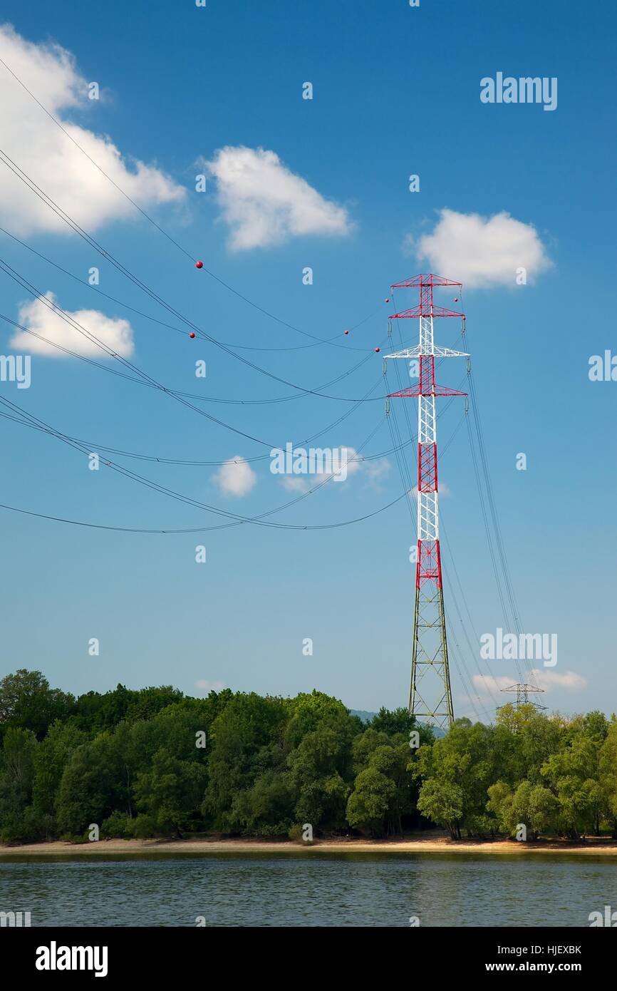 Tall electricity tower at a river crossing Stock Photo Alamy