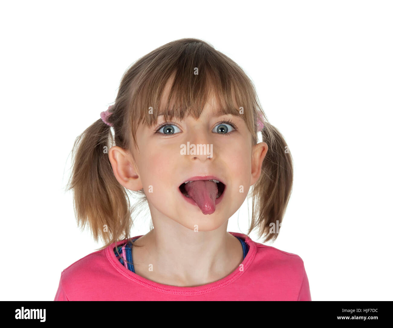 girl sticks his tongue out Stock Photo