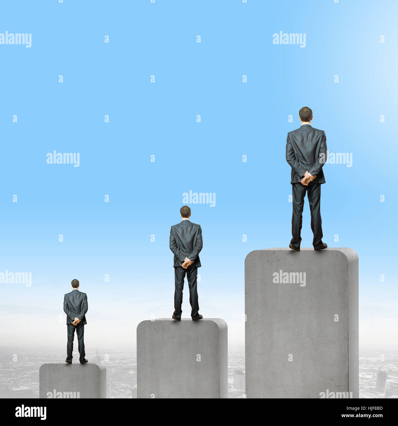 Three little man standing hi-res stock photography and images - Alamy
