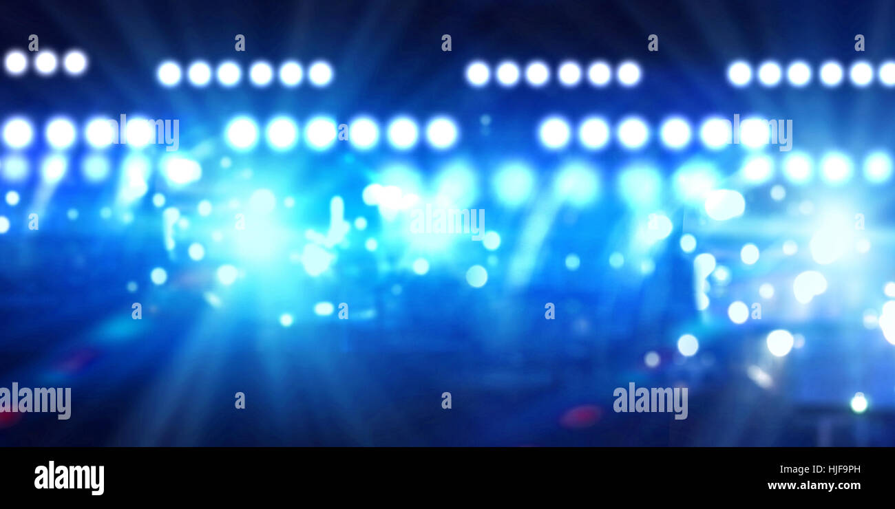 Background image of stage in color lights Stock Photo - Alamy