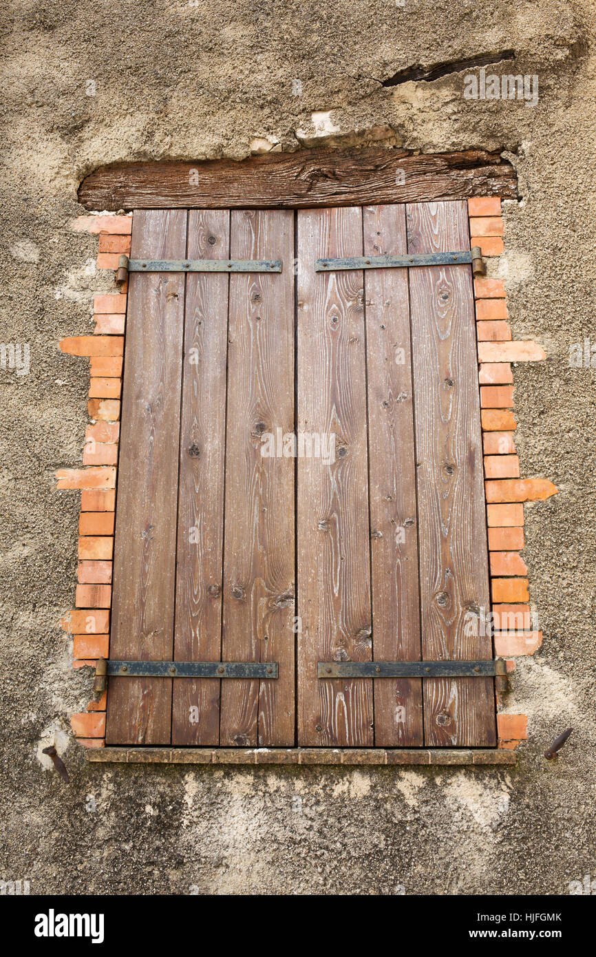 picture of a wooden shuttered window of an old house Stock Photo - Alamy