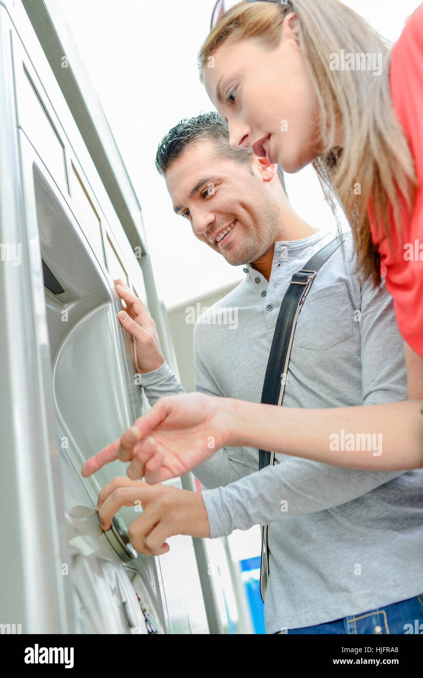 Buying a tram ticket Stock Photo Alamy