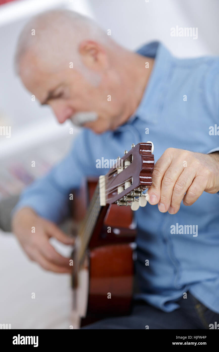senior playing guitar Stock Photo Alamy