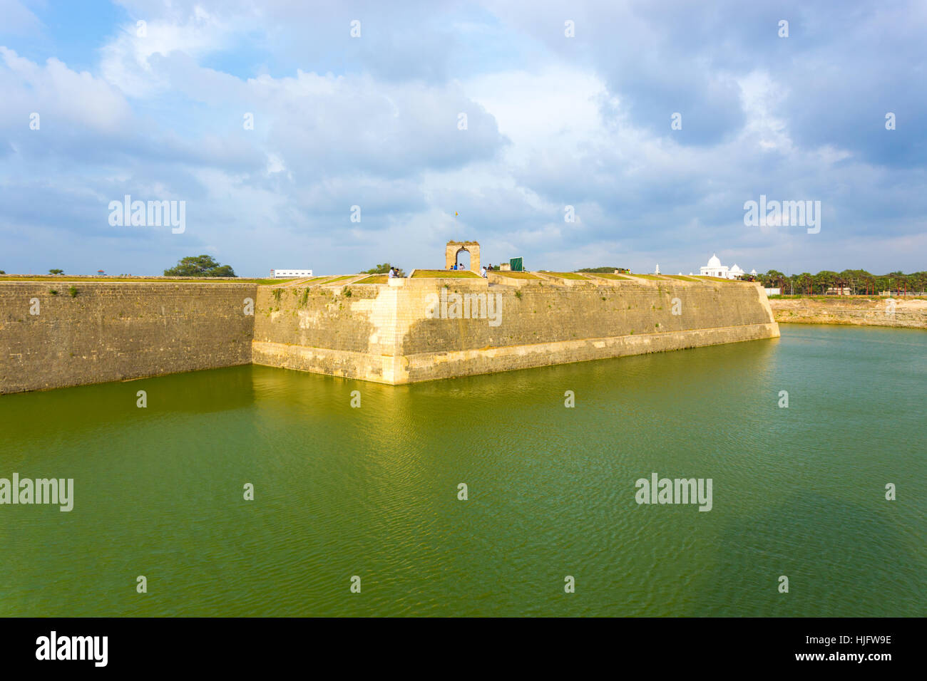 Exterior of Jaffna fort with rampart over moat water on a sunny day in Sri Lanka. Horizontal Stock Photo