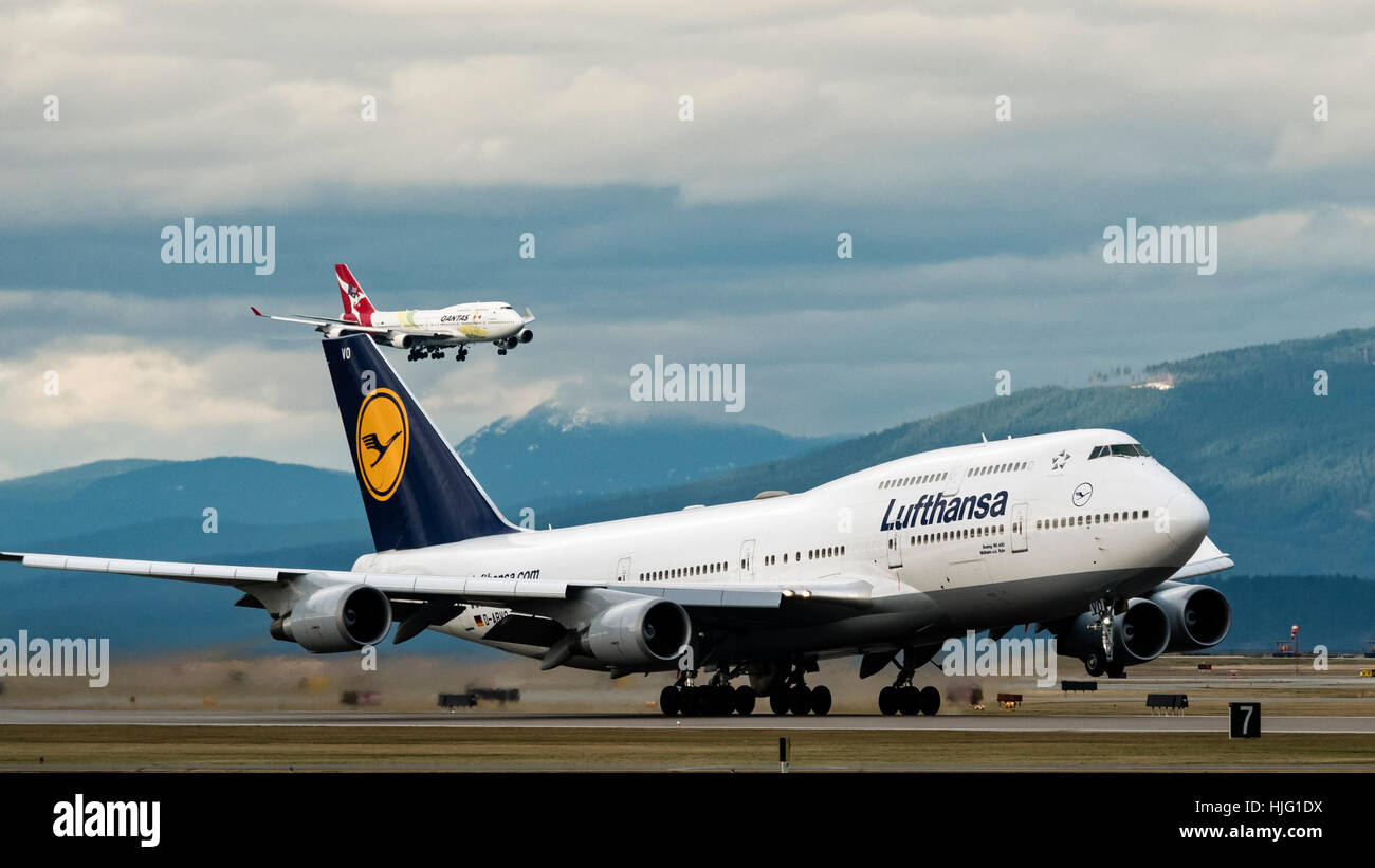 Boeing 747 widebody jet airliners belonging to Lufthansa and Qantas at