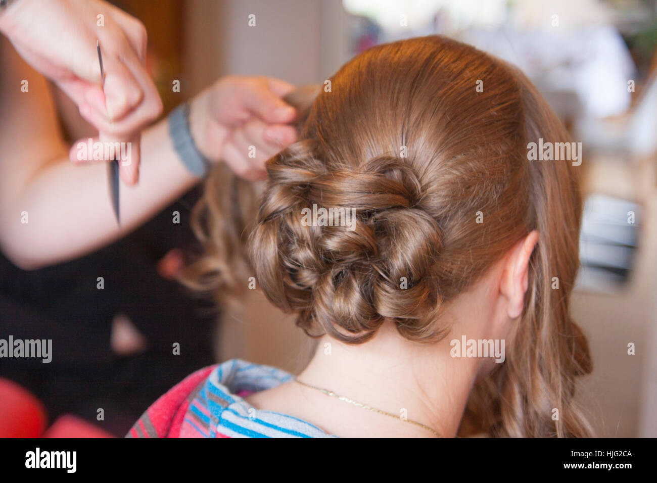 Bride,hair,hairstyle,brim,hairdresser,hairpin,hairstylist,hands,head,brown,beautiful,noble,ornate,high,Celebration,Ceremony,Marr Stock Photo