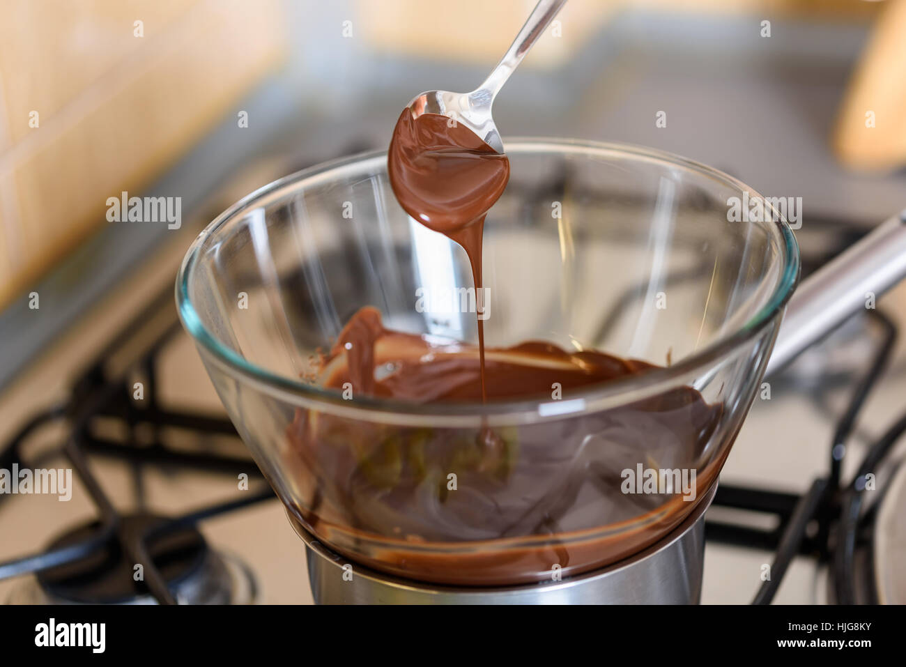 Melting chocolate stove hires stock photography and images Alamy