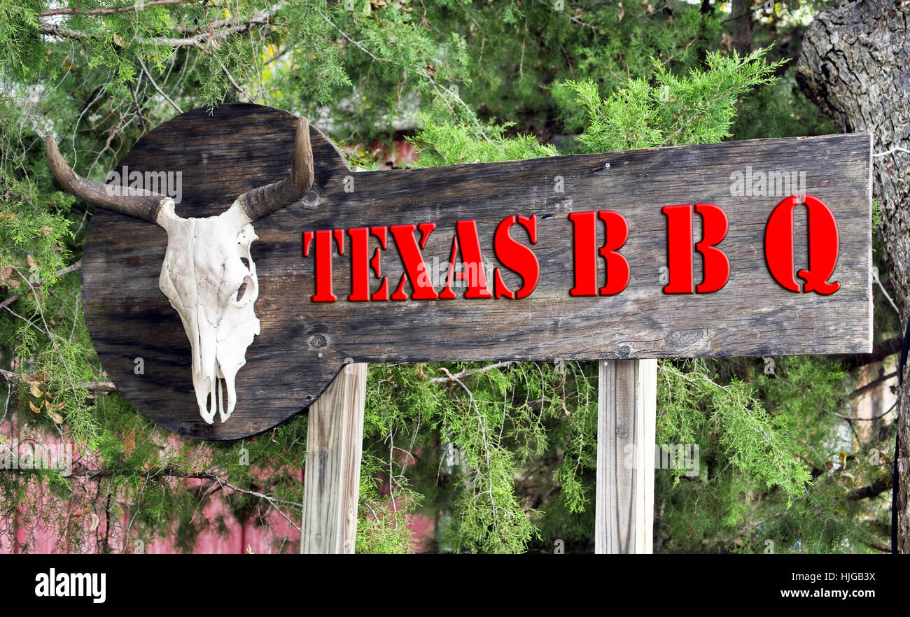 Texas BBQ sign with cow skull. Stock Photo