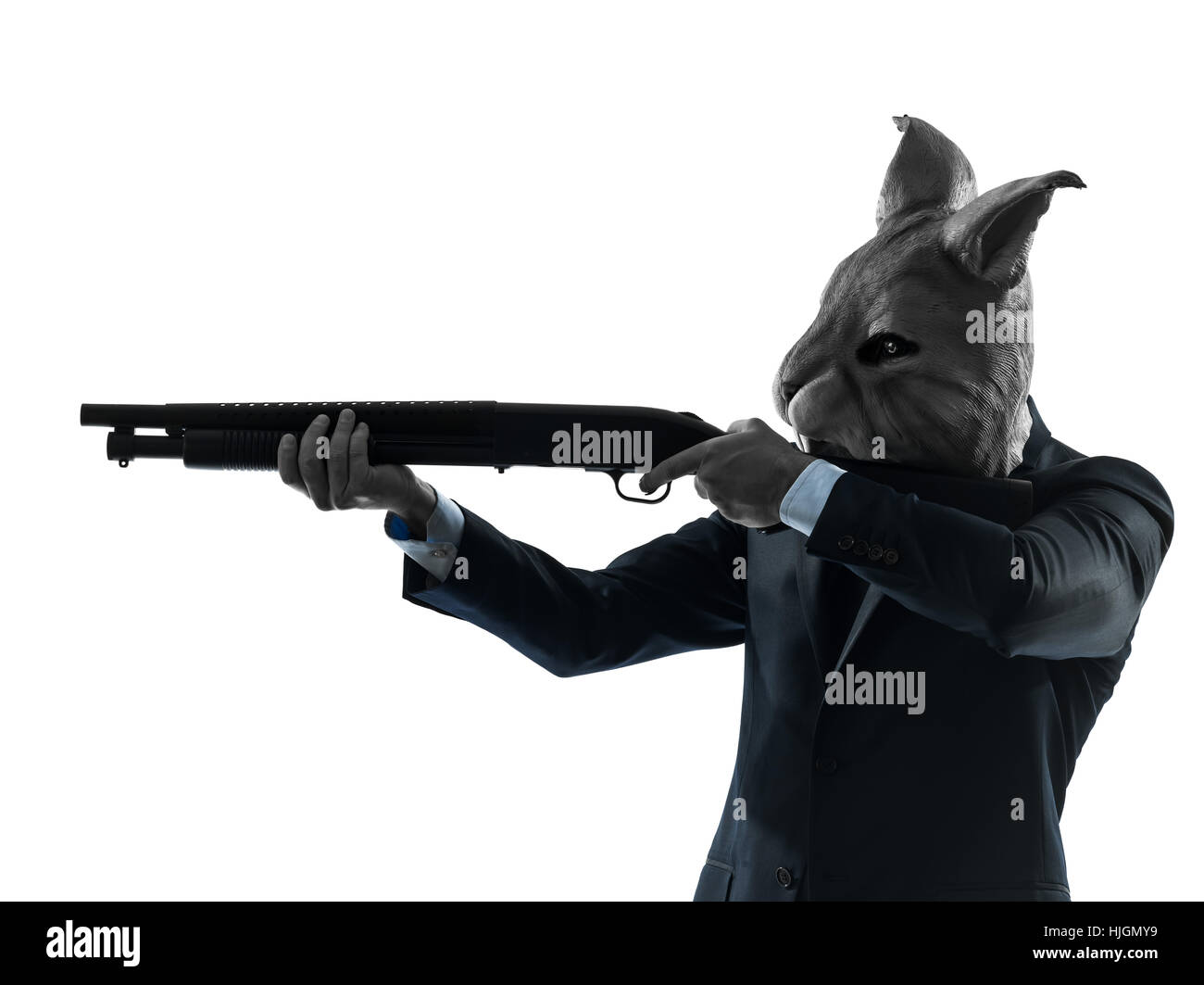 one caucasian man rabbit mask hunting with shotgun portrait in