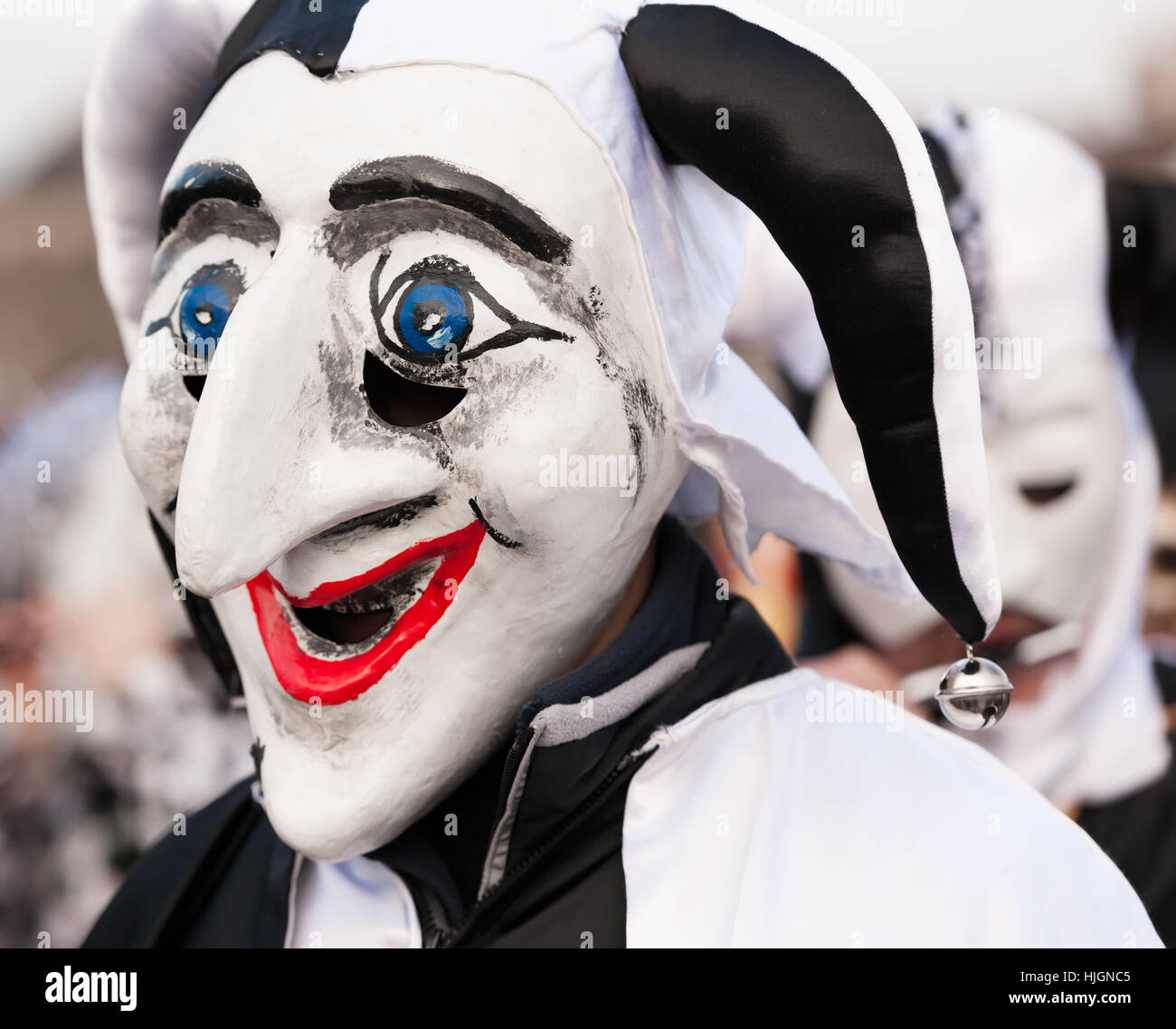 Black and white jester mask at fasnacht carnival in Basel, Switzerland