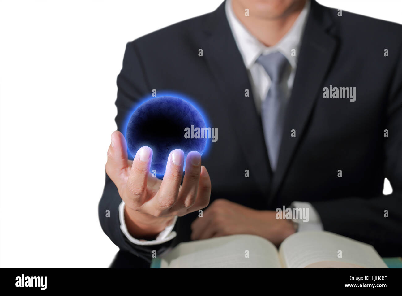 Business man hand hold the blue earth as everything can do Concept. Stock Photo