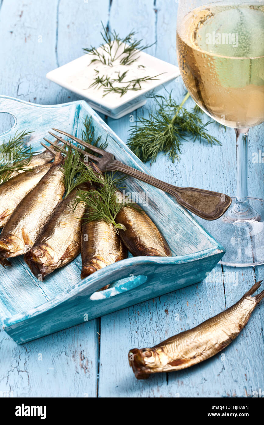 fresh fish with white wine Stock Photo Alamy
