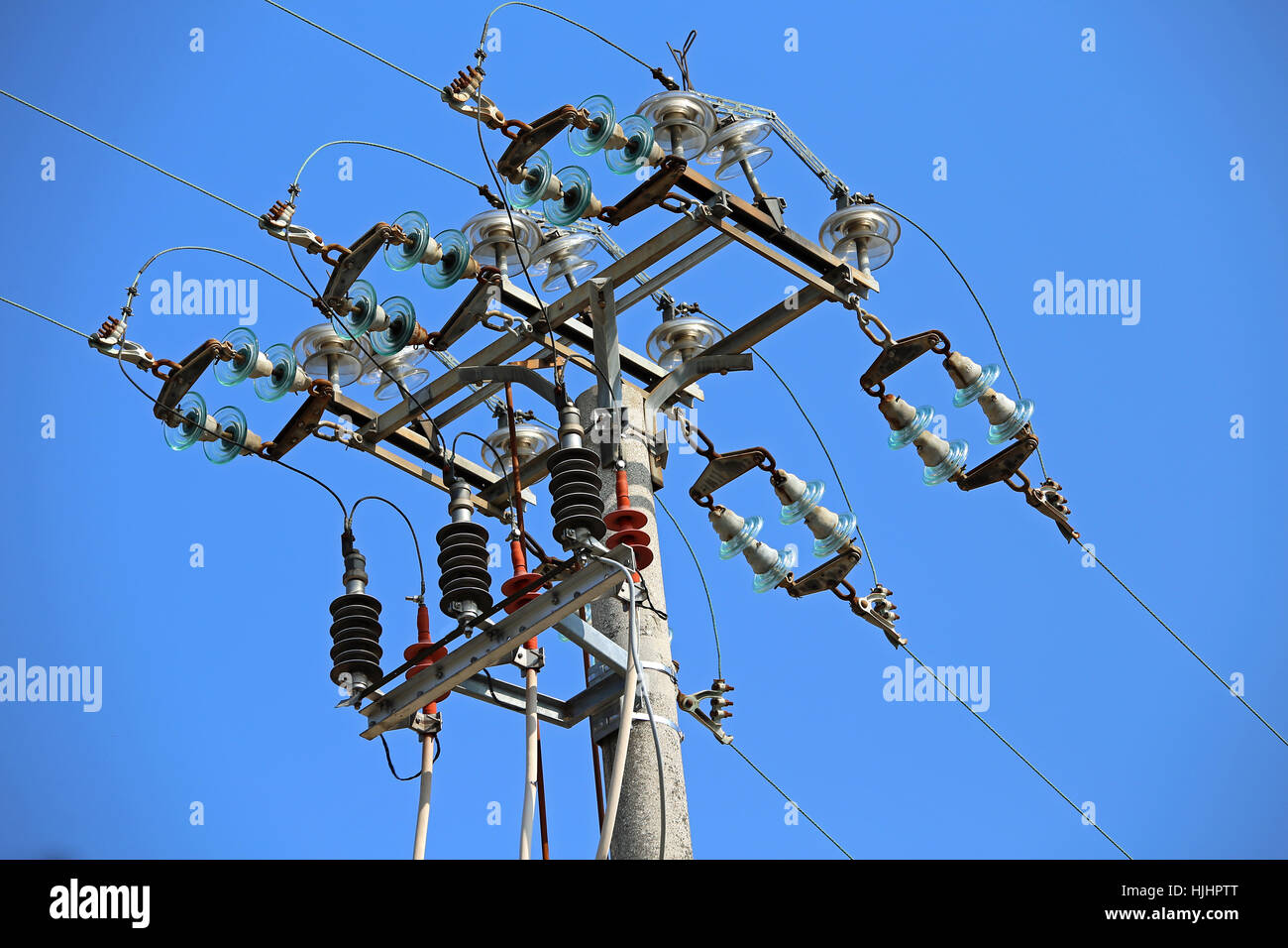 switches in air of a high voltage power line with concrete pole and