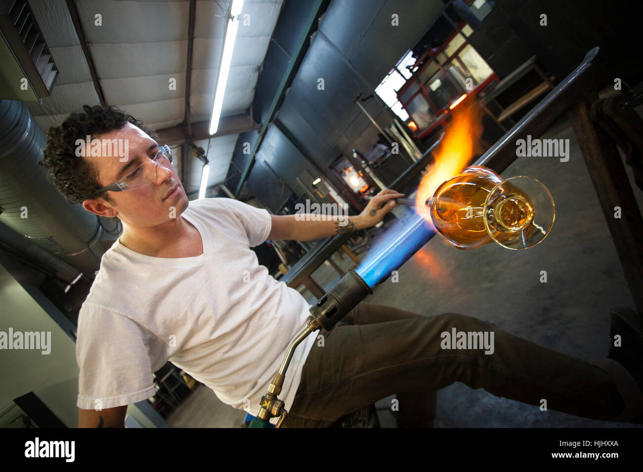 Man Using Blowtorch Young man working with blowtorch on glass object Stock Photo - Alamy