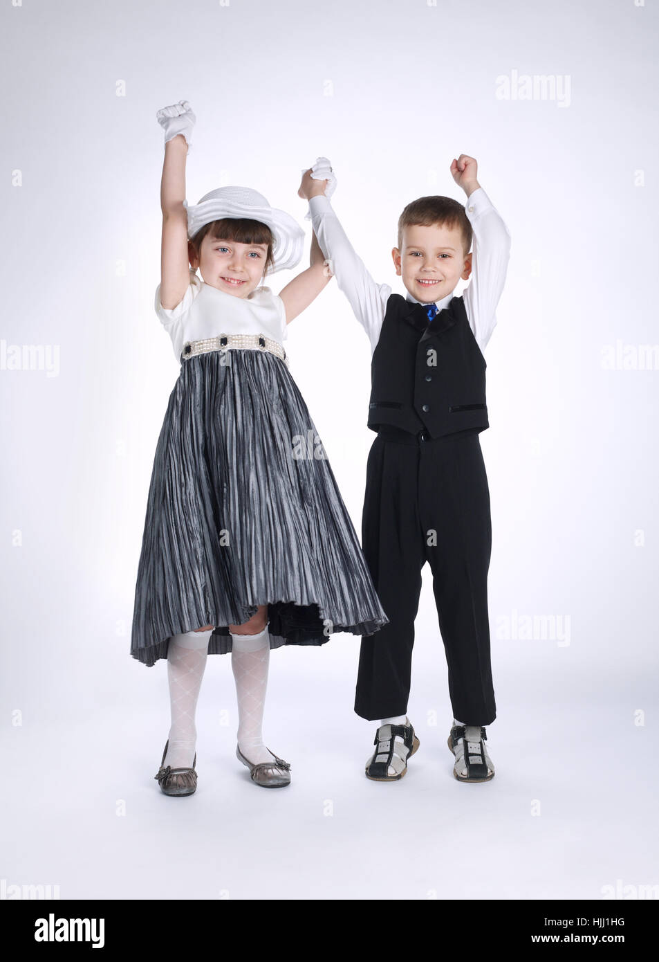 boy and girl holding hands Stock Photo - Alamy