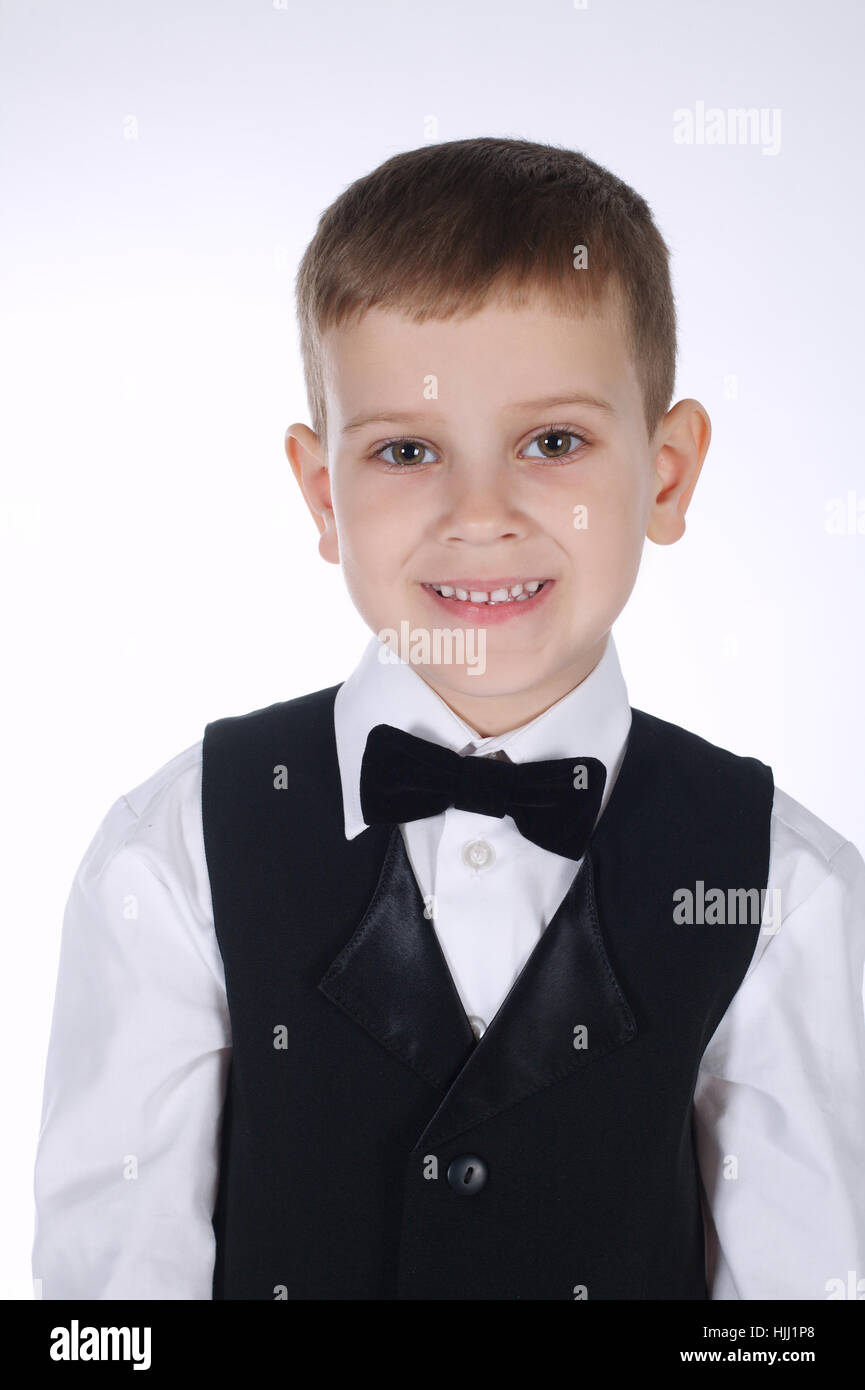 little boy with bow tie on white Stock Photo Alamy