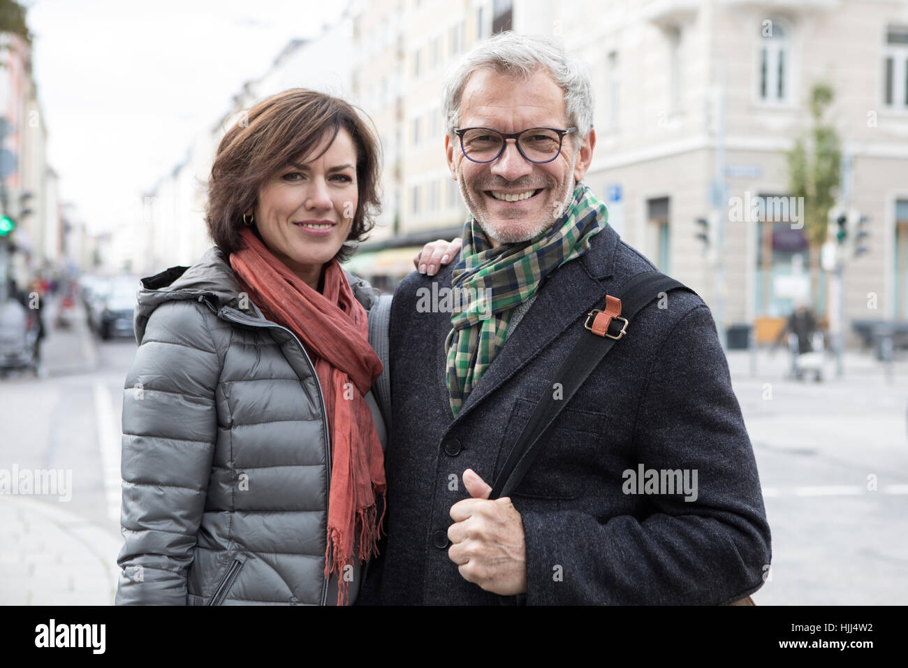 Portrait of smiling mature couple outdoors Stock Photo - Alamy