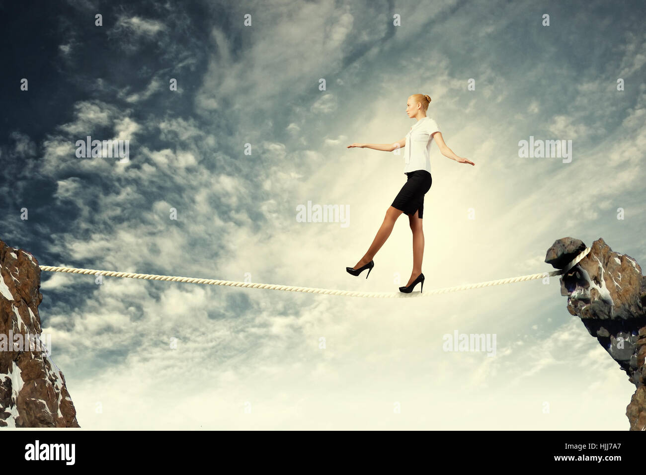 Woman acrobat balancing on rope hi-res stock photography and images - Alamy