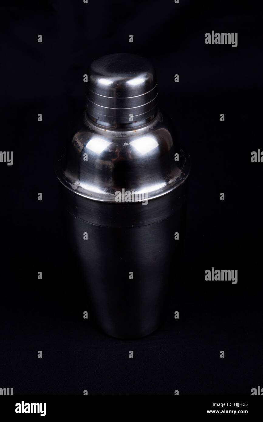 Cocktail shaker isolated on black background Stock Photo - Alamy