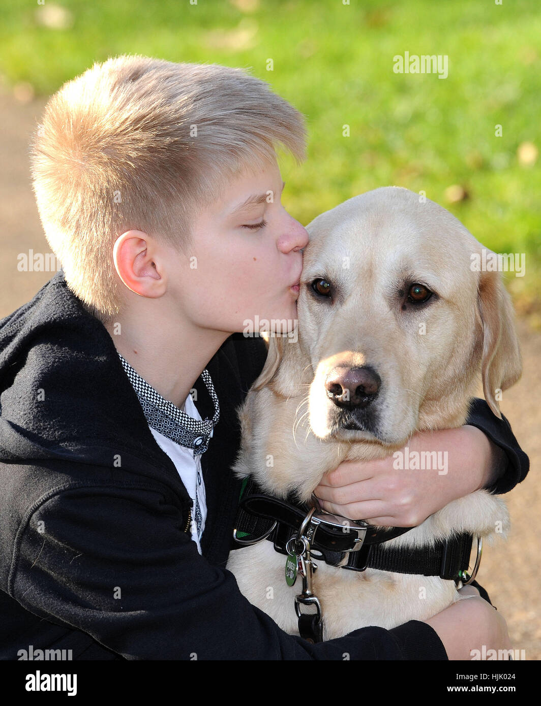 Joel Sawyer, 13, from Newquay, Cornwall, with Caddie, his Labrador