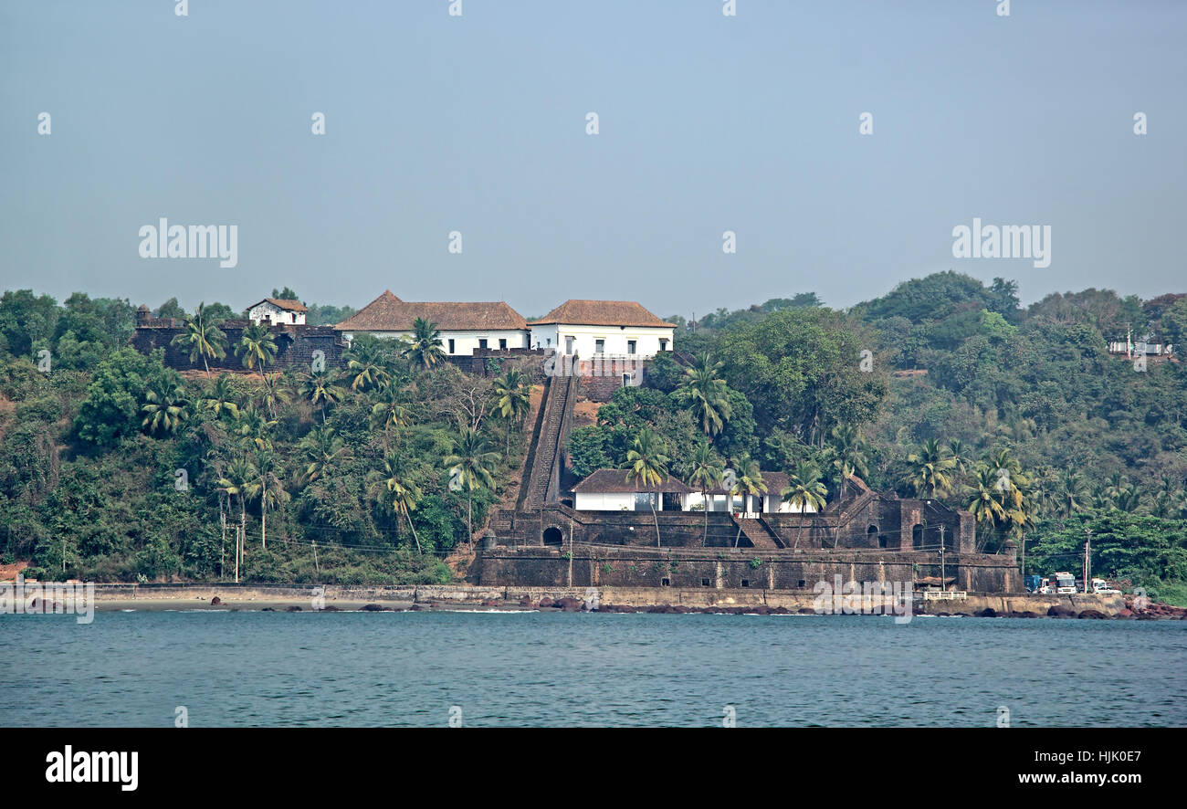 Renovated Portuguese era Reis Magos Fort in Goa, India, view from Mondovi River Stock Photo