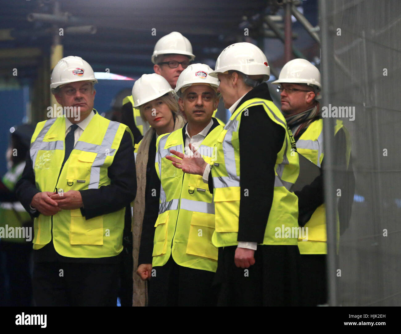 EDITORIAL USE ONLY Sharon Ament, Director of the Museum of London (right), speaks to Mayor of London Sadiq Khan (centre), Justine Simons, Deputy Mayor for Culture and the Creative Industries (2nd left) and Mark Boleat, Chairman of the Policy and Resources Committee at the City of London Corporation (left), during a visit to Smithfield General Market. Plans for a new Museum of London at West Smithfield have been given a major boost thanks to support from the City of London Corporation and the Mayor, who have pledged &Acirc;&pound;110 million and &Acirc;&pound;70 million respectively. Stock Photo