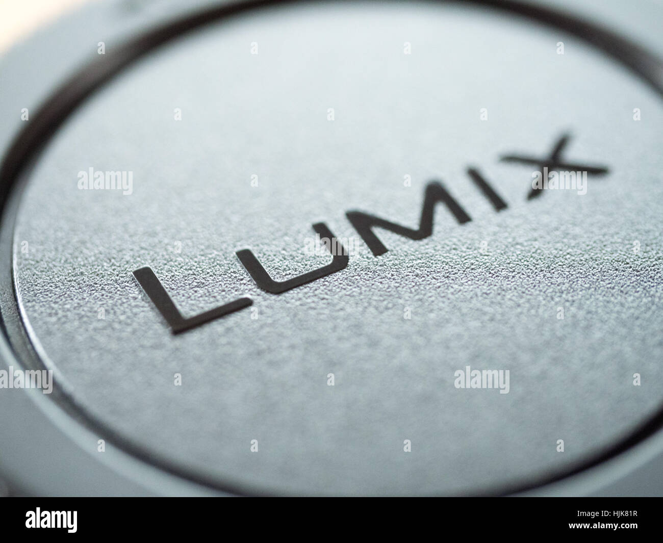 The word Lumix from a Panasonic Lumix lens cap Stock Photo