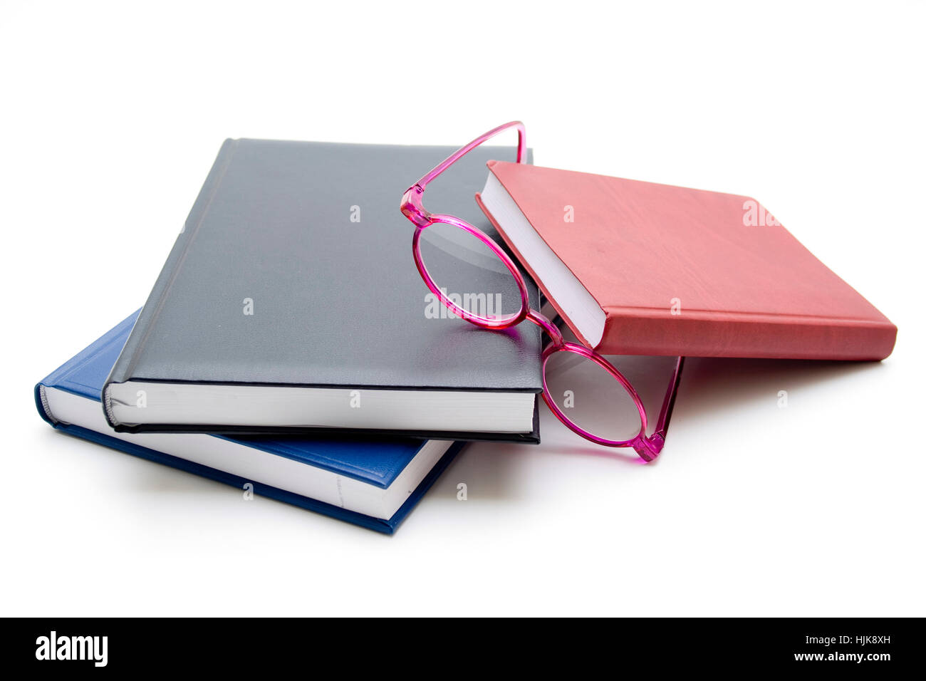 notebook with reading glasses Stock Photo