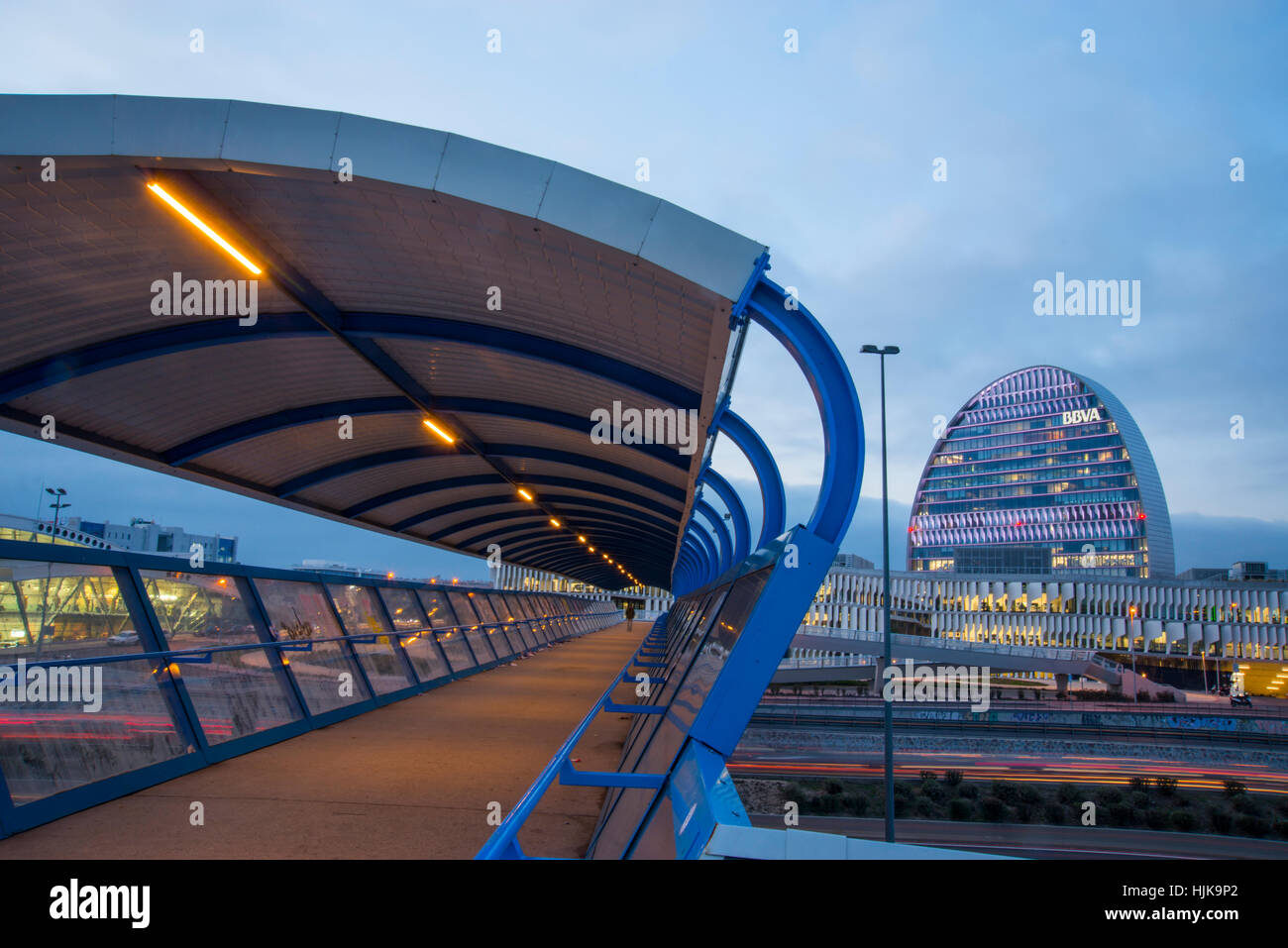 La Vela building and footbridge over A-1 freeway, night view. Sanchinarro, Madrid, Spain. Stock Photo