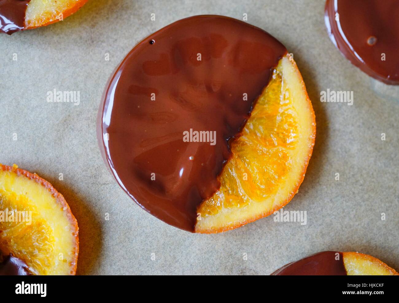 Making candied orange slices dipped in dark chocolate Stock Photo Alamy