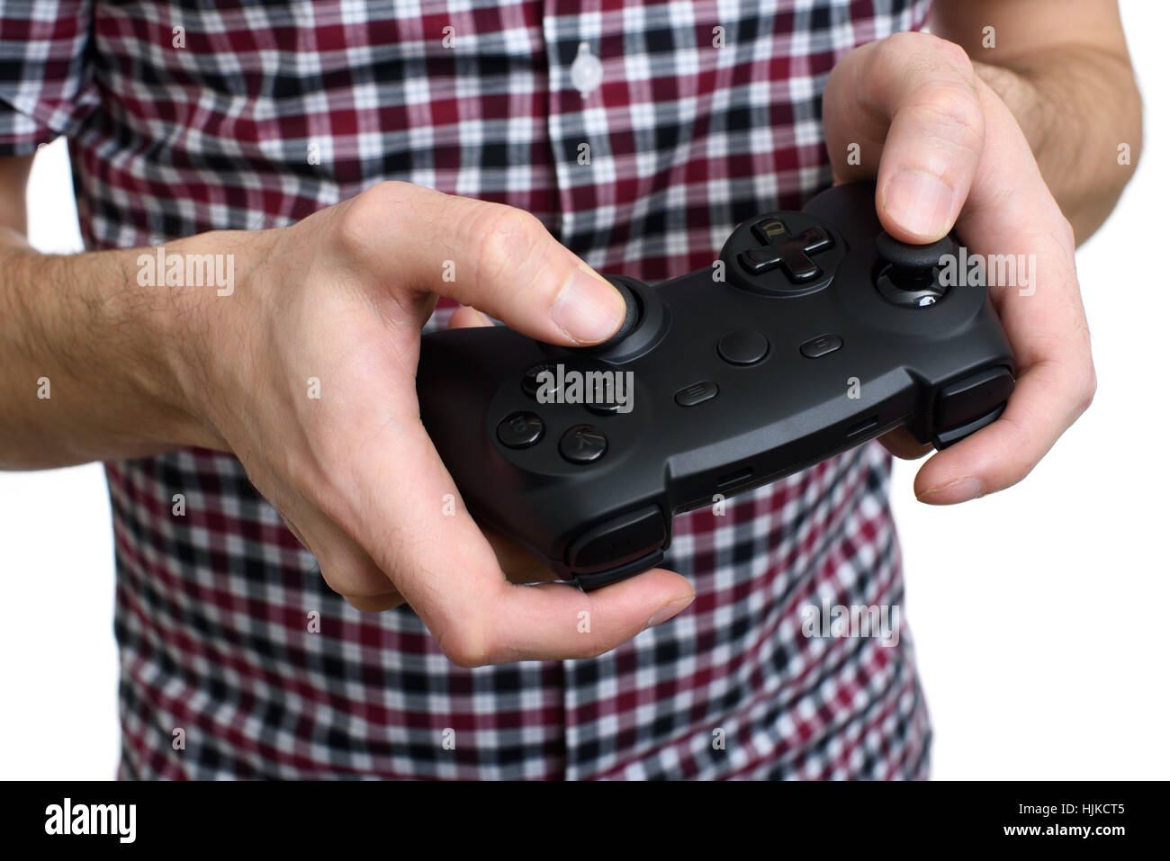Premium Photo  Close up of gamer holding controller to play video games in  front of computer. player using joystick and playing online games on  monitor, sitting at desk. man gaming with