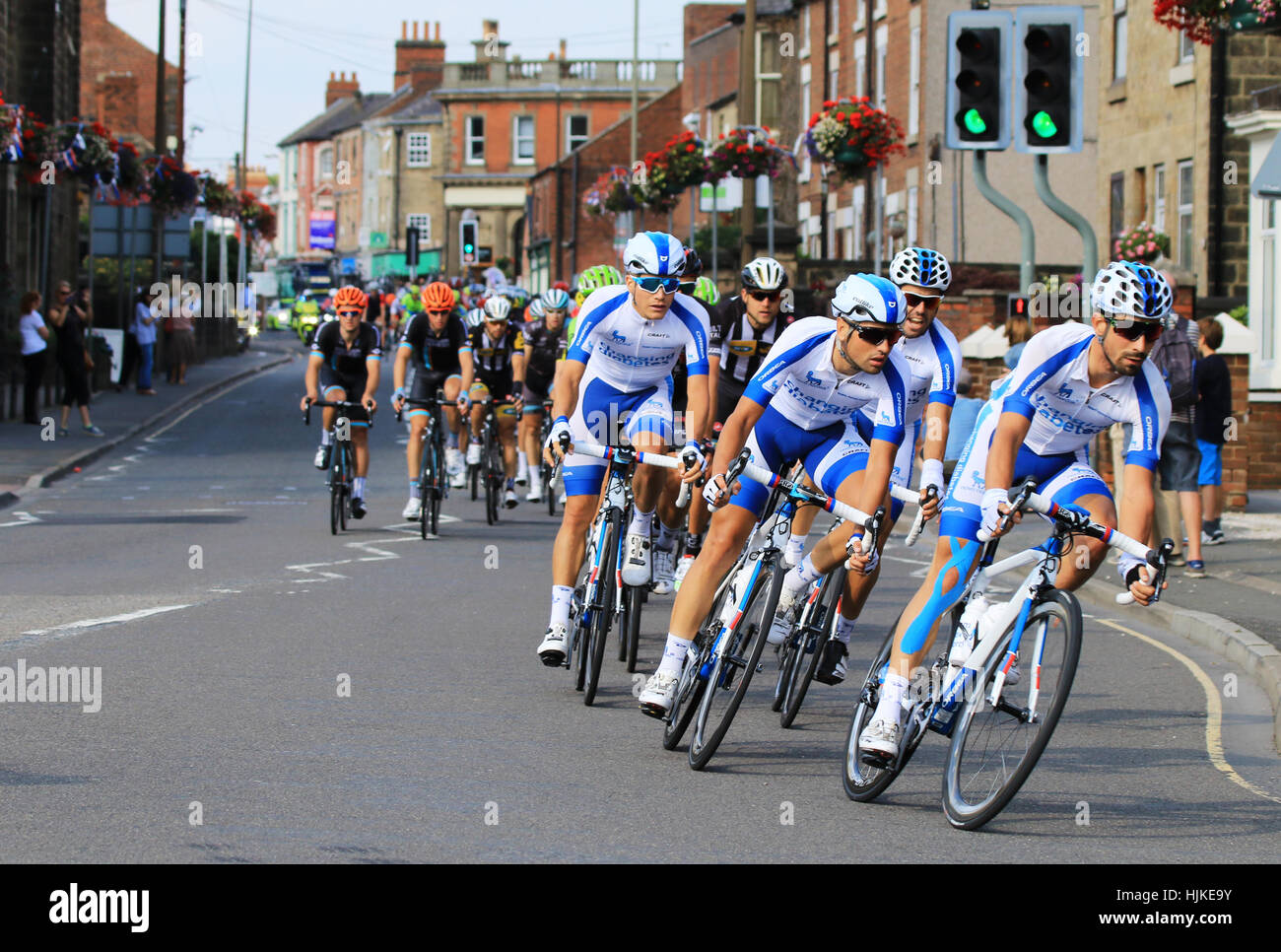 The Tour of Britain speeds through the Derbyshire town of Belper, on the 11th September 2015. Stock Photo