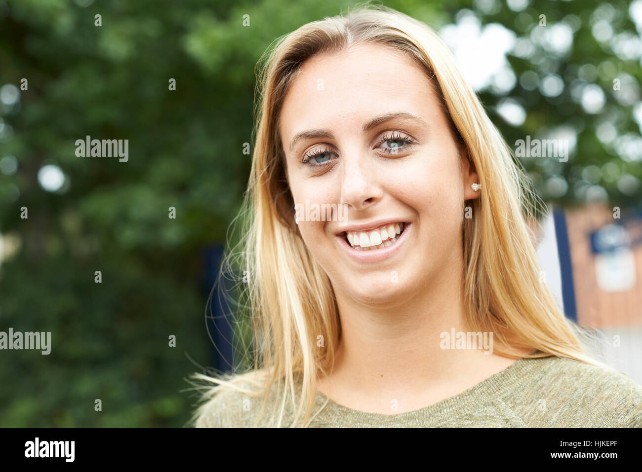 Head And Shoulders Portrait Of Smiling Teenage Girl Stock Photo - Alamy