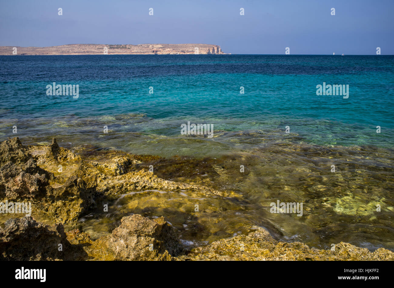 The beautiful blue waters looking out to sea from Malta Stock Photo
