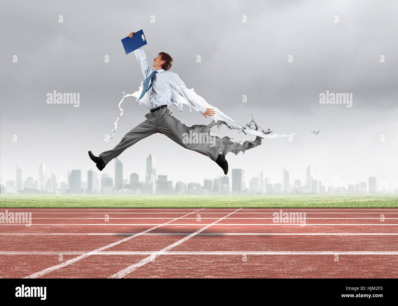 Funny young office worker running in a hurry Stock Photo - Alamy