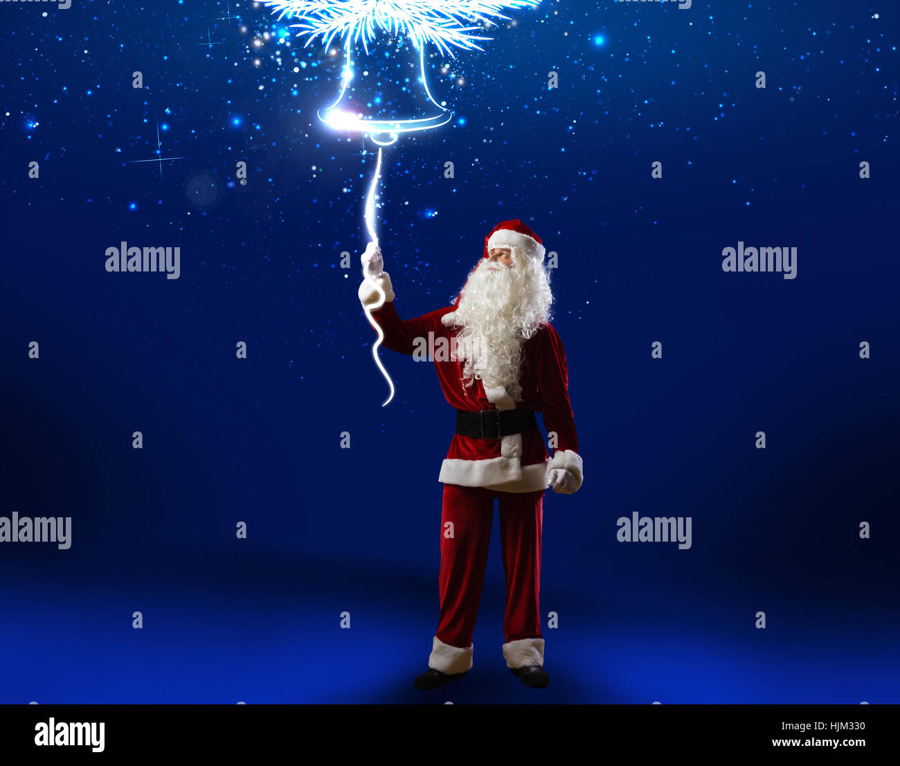 Santa Claus ringing the Christmas bell. New Year eve Stock Photo - Alamy