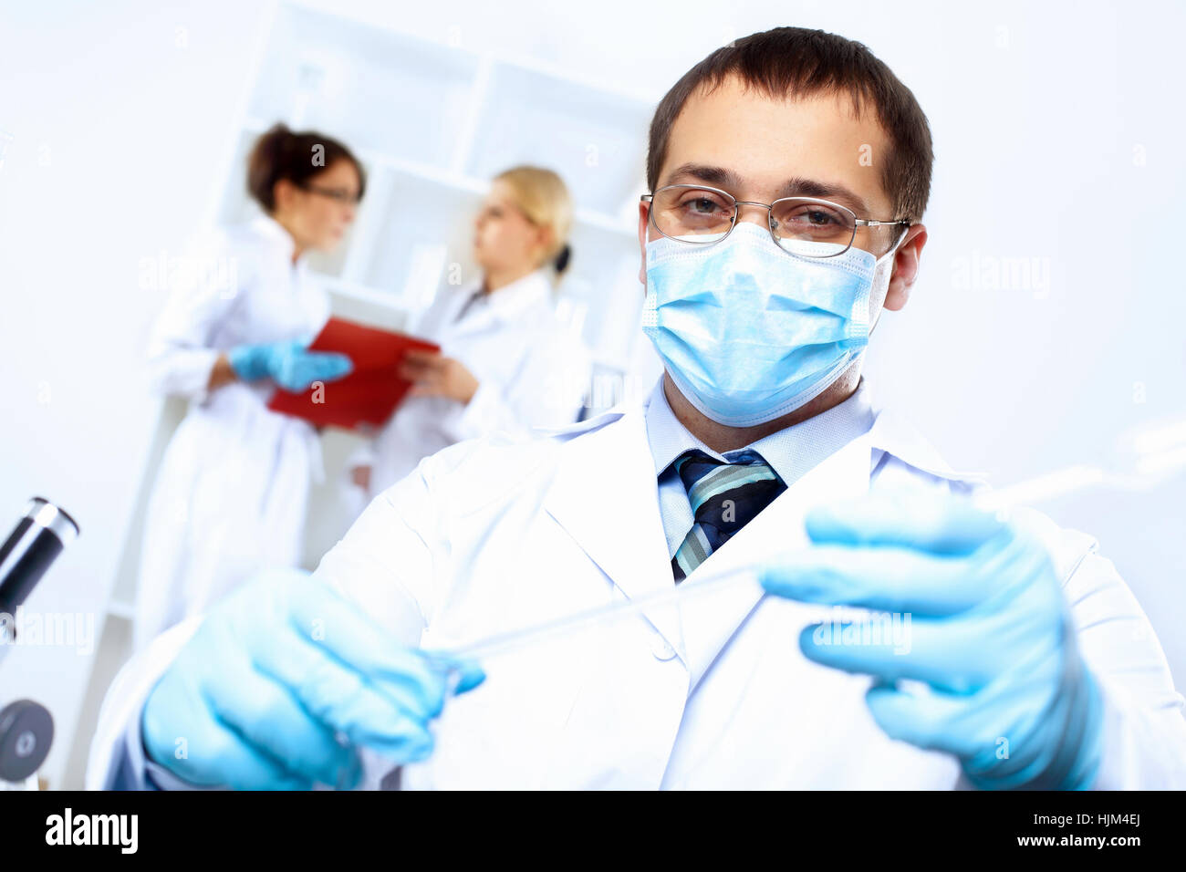Dooing Lab Scientist in uniform doing tests in laboratory Stock Photo - Alamy